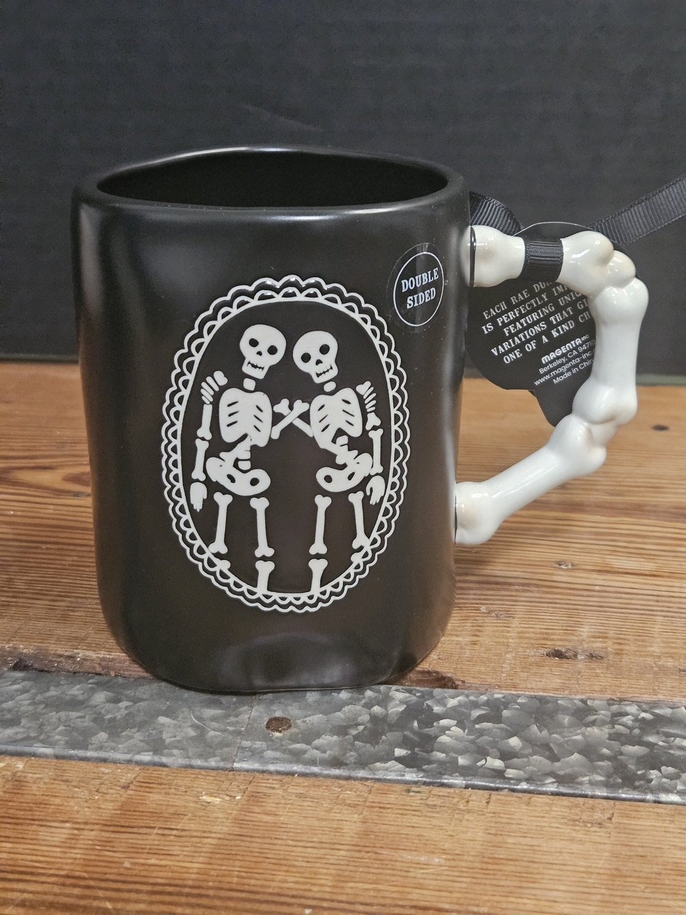 Rae Dunn Black Ceramic Mug with White Skeleton Handle and Artwork